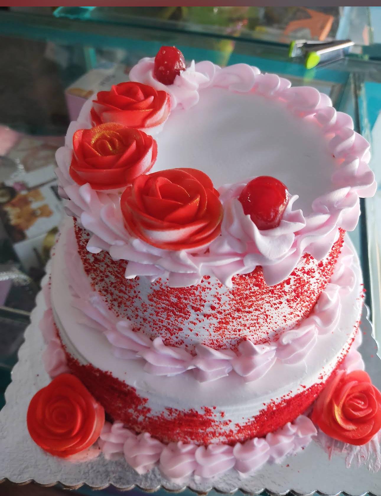 Baker decorating cake